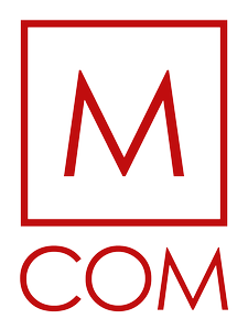 M COM
